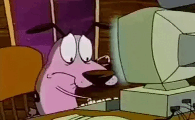Courage the Cowardly Dog typing frantically on his computer