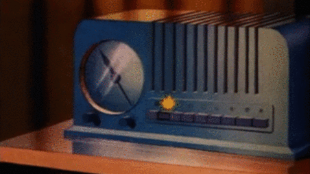 Donald Duck frantically adjusting his old radio