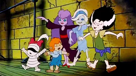 Five school girls from Scooby Doo and the Ghoul School, the daughters of classic horror monsters, cheering