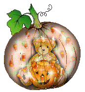 a pumpkin-shaped, animated 'snowglobe' containing a teddy bear with a jack-o-lantern, and candy corn floating around
